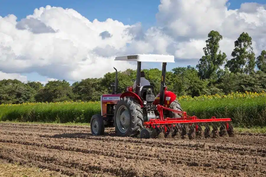 Land Preparation With Tractor, Tractor Plows A Field, Agriculture